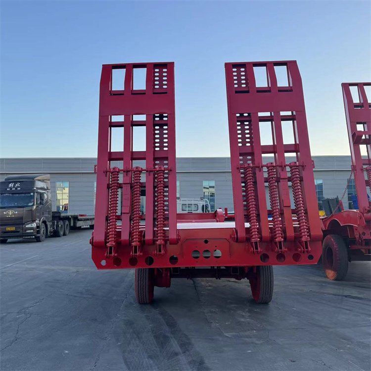 11米大件設(shè)備運輸車三橋低平板半掛車機(jī)械爬梯拖板車三道彈簧