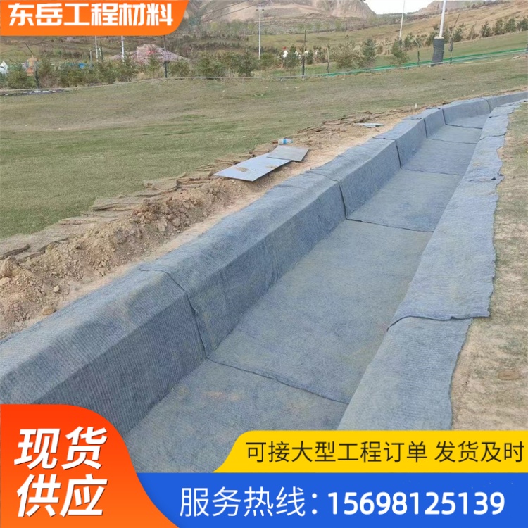 新型護(hù)坡水泥毯魚(yú)塘防滲毯柔性水泥纖維毯5-12公斤